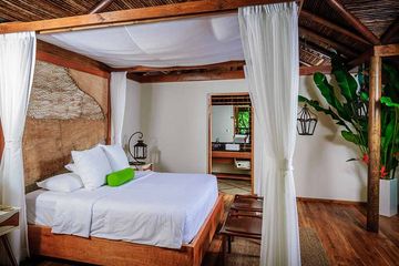 Pacuare Lodge Flussblick Suite Blick ins Schlafzimmer