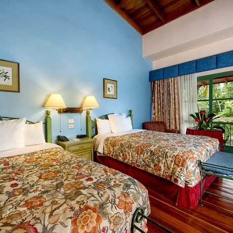 Hotel Casa Turire Deluxezimmer 02 Blick auf zwei Betten in einem Deluxezimmer des Hotels Casa Turire