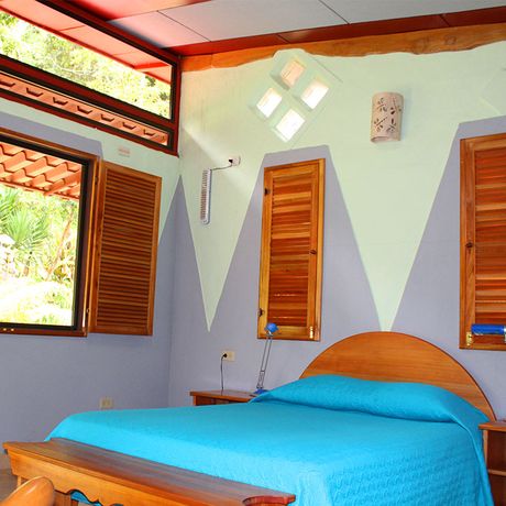 Dschungel-Lodge-Talamanca Flussbungalow Doppelbett im Flussbungalow der Dschungel-Lodge-Talamanca