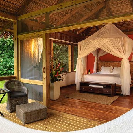 Pacuare Lodge Gartensuite Schlafzimmer am Abend Gartensuite Schlafzimmer am Abend