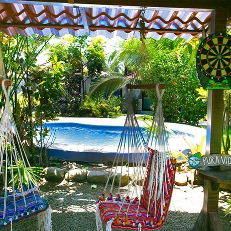Blick auf den Pool der Strandunterkunft B&B El Encanto Inn