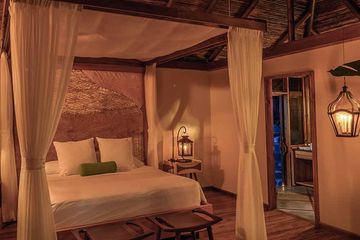 Pacuare Lodge Flussblick Suite Schlafzimmer am Abend