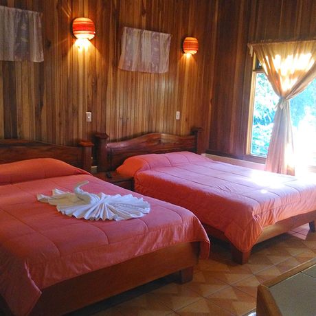 Pension Monteverde Villa Lodge Standardzimmer 02 Blick auf die Betten eines Standardzimmers in der Pension Monteverde Villa Lodge