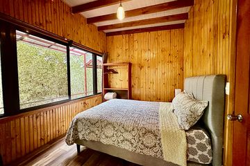 Hotel de Montaña El Pelícano Deluxebungalow Bett
