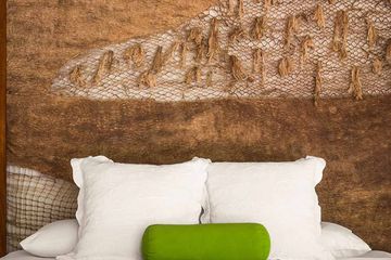 Pacuare Lodge Flussblick Suite Details im Schlafzimmer