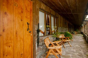 Poas Volcano Lodge Gartenzimmer Stühle